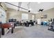 Spacious garage with light walls, white ceiling, and large white door at 4074 Center Rd., Georgetown, SC 29440