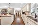 Open concept kitchen with granite countertops, stainless steel appliances, and hardwood floors at 4074 Center Rd., Georgetown, SC 29440