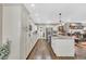 Bright kitchen features granite countertops, a center island, stainless steel appliances, and hardwood flooring at 4074 Center Rd., Georgetown, SC 29440
