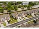 Aerial view showcases the meticulously landscaped townhouses with private driveways and verdant surroundings at 4355 Willoughby Ln. # 401, Myrtle Beach, SC 29577