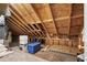 Unfinished attic space revealing roof supports and storage at 4355 Willoughby Ln. # 401, Myrtle Beach, SC 29577