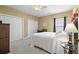 Bedroom with white closets, white bedding and a desk for work at 4355 Willoughby Ln. # 401, Myrtle Beach, SC 29577