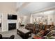 Comfortable living area featuring fireplace, backyard access and open floorplan at 4355 Willoughby Ln. # 401, Myrtle Beach, SC 29577