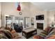 Inviting living room with fireplace, modern television, and backyard access at 4355 Willoughby Ln. # 401, Myrtle Beach, SC 29577