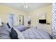 Bedroom featuring two beds, soft lighting, and beach-themed decor for a relaxing atmosphere at 4737 Wild Iris Dr. # 203, Myrtle Beach, SC 29577
