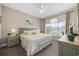 Comfortable bedroom features a large bed, a decorative window, and coordinating nightstands at 4737 Wild Iris Dr. # 203, Myrtle Beach, SC 29577