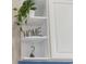 Stylish shelving unit with decorative items, adding a touch of personality to the space at 4737 Wild Iris Dr. # 203, Myrtle Beach, SC 29577