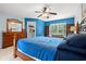 Bedroom featuring a wooden bed frame, ceiling fan, and a classic wooden dresser at 480 Dandelion Ln., Myrtle Beach, SC 29579