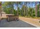 Enjoy relaxing in your private hot tub surrounded by tall trees at 480 Dandelion Ln., Myrtle Beach, SC 29579