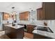 Stylish kitchen with granite countertops, stainless steel appliances, a center island, and modern cabinetry at 480 Dandelion Ln., Myrtle Beach, SC 29579