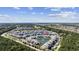 Aerial view of community featuring pond, fountain, lush greenery and neighborhood at 4828 Magnolia Lakes Dr. # 404, Myrtle Beach, SC 29577