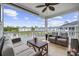 Relaxing balcony with comfortable seating and a picturesque lake view at 4828 Magnolia Lakes Dr. # 404, Myrtle Beach, SC 29577