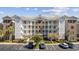 Beautiful condo building with a well maintained exterior and balconies in a professionally landscaped community at 4828 Magnolia Lakes Dr. # 404, Myrtle Beach, SC 29577