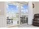 Relaxing view from inside, looking out to a scenic patio and peaceful waterfront at 4828 Magnolia Lakes Dr. # 404, Myrtle Beach, SC 29577