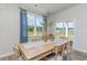 Dining room features a large window with a view and seating for six at 489 Blissful Ln., Little River, SC 29566