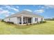 Home exterior highlighting the backyard, patio, and well-maintained landscaping at 489 Blissful Ln., Little River, SC 29566