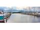View of a marina filled with boats, offering waterfront living and recreation at 489 Blissful Ln., Little River, SC 29566