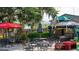 Outdoor restaurant patio with seating, shade, and a casual dining atmosphere at 489 Blissful Ln., Little River, SC 29566