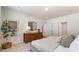 Comfortable bedroom with soft carpet, neutral colors, and ample natural light at 497 Blissful Ln., Little River, SC 29566