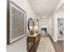 Inviting hallway with modern decor, wood flooring, and a glimpse of the living areas at 497 Blissful Ln., Little River, SC 29566