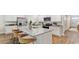 Spacious kitchen with island seating, granite countertops, and stainless steel appliances at 497 Blissful Ln., Little River, SC 29566