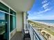 Relaxing balcony area with chair and views of the coastline and ocean at 5200 N Ocean Blvd. # 640, Myrtle Beach, SC 29577