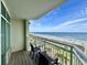 Relaxing balcony view overlooking a beautiful beach, ideal for enjoying serene coastal moments at 5200 N Ocean Blvd. # 640, Myrtle Beach, SC 29577