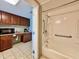 An accessible bathroom next to the kitchen, featuring grab bars for added safety and convenience at 5200 N Ocean Blvd. # 640, Myrtle Beach, SC 29577