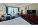 Living area with TV, ocean view, sofa and balcony access at 5200 N Ocean Blvd. # 640, Myrtle Beach, SC 29577