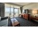 Bright living room featuring balcony access with stunning ocean views and comfortable seating at 5200 N Ocean Blvd. # 640, Myrtle Beach, SC 29577