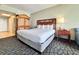 Comfortable bedroom featuring a queen-sized bed and custom headboard at 5200 N Ocean Blvd. # 640, Myrtle Beach, SC 29577
