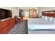 Well-designed room showcasing a queen bed, storage, kitchen, and eating areas at 5200 N Ocean Blvd. # 640, Myrtle Beach, SC 29577