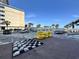 Pool area with giant checkers, stacked yellow floats, and beach access at 5200 N Ocean Blvd. # 640, Myrtle Beach, SC 29577
