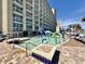 splash pad with colorful fountains and seating, set against condo building at 5200 N Ocean Blvd. # 640, Myrtle Beach, SC 29577