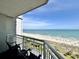 Relaxing ocean view from private balcony of the condo, equipped with seating at 5300 N Ocean Blvd. # 1102, Myrtle Beach, SC 29577