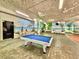 Inviting billiard room with a pool table, mural, and comfortable seating for leisure and recreation at 5300 N Ocean Blvd. # 1102, Myrtle Beach, SC 29577