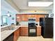 Well-equipped kitchen featuring stainless steel appliances and ample cabinet space at 5300 N Ocean Blvd. # 1102, Myrtle Beach, SC 29577