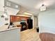 Well-equipped kitchen with breakfast bar, stainless sink, and sleek appliances at 5300 N Ocean Blvd. # 1102, Myrtle Beach, SC 29577
