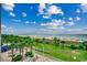Aerial view of oceanfront property with pool, lawn chairs and beach access at 5300 N Ocean Blvd. # 410, Myrtle Beach, SC 29577