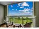 Ocean view from balcony with two chairs and a small table at 5300 N Ocean Blvd. # 410, Myrtle Beach, SC 29577