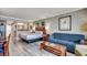 Comfortable living space with bed, seating, dining table, and beach decor at 5300 N Ocean Blvd. # 410, Myrtle Beach, SC 29577