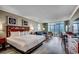 Spacious main bedroom with an ocean view, couch, television, and a large bed at 5300 N Ocean Blvd. # 410, Myrtle Beach, SC 29577