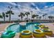 Lazy river with tropical landscaping, perfect for relaxing and enjoying the outdoors at 5300 Ocean Blvd. N # 903, Myrtle Beach, SC 29577