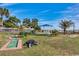 Community mini golf course in a lush setting with blue gazebo and beach views at 5300 Ocean Blvd. N # 903, Myrtle Beach, SC 29577