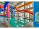Indoor water park with slides, a playful whale mural, and beach views for year-round entertainment at 5300 Ocean Blvd. N # 903, Myrtle Beach, SC 29577