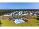 New community aerial view showing pool, amenities, and surrounding homes at 541 Magnolia Terrace Dr, Myrtle Beach, SC 29579