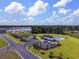 New community aerial showing lots, pool, lake, and amenities at 541 Magnolia Terrace Dr, Myrtle Beach, SC 29579