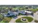 Aerial view of the golf course and clubhouse showcasing pristine landscaping and amenities at 5545 Whitebark Dr., Myrtle Beach, SC 29577