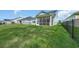 Fenced in yard with the house and enclosed porch at 5545 Whitebark Dr., Myrtle Beach, SC 29577