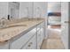 Bathroom vanity with double sinks and view into bedroom with bunk beds at 5545 Whitebark Dr., Myrtle Beach, SC 29577